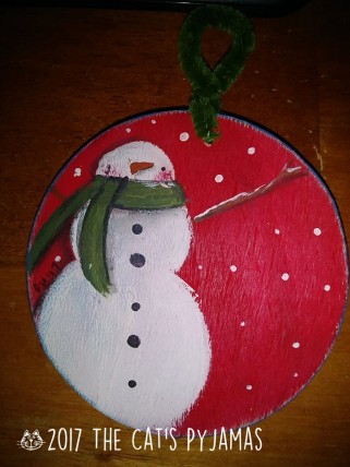 Snowman on red ornament Snowman on red ornament
